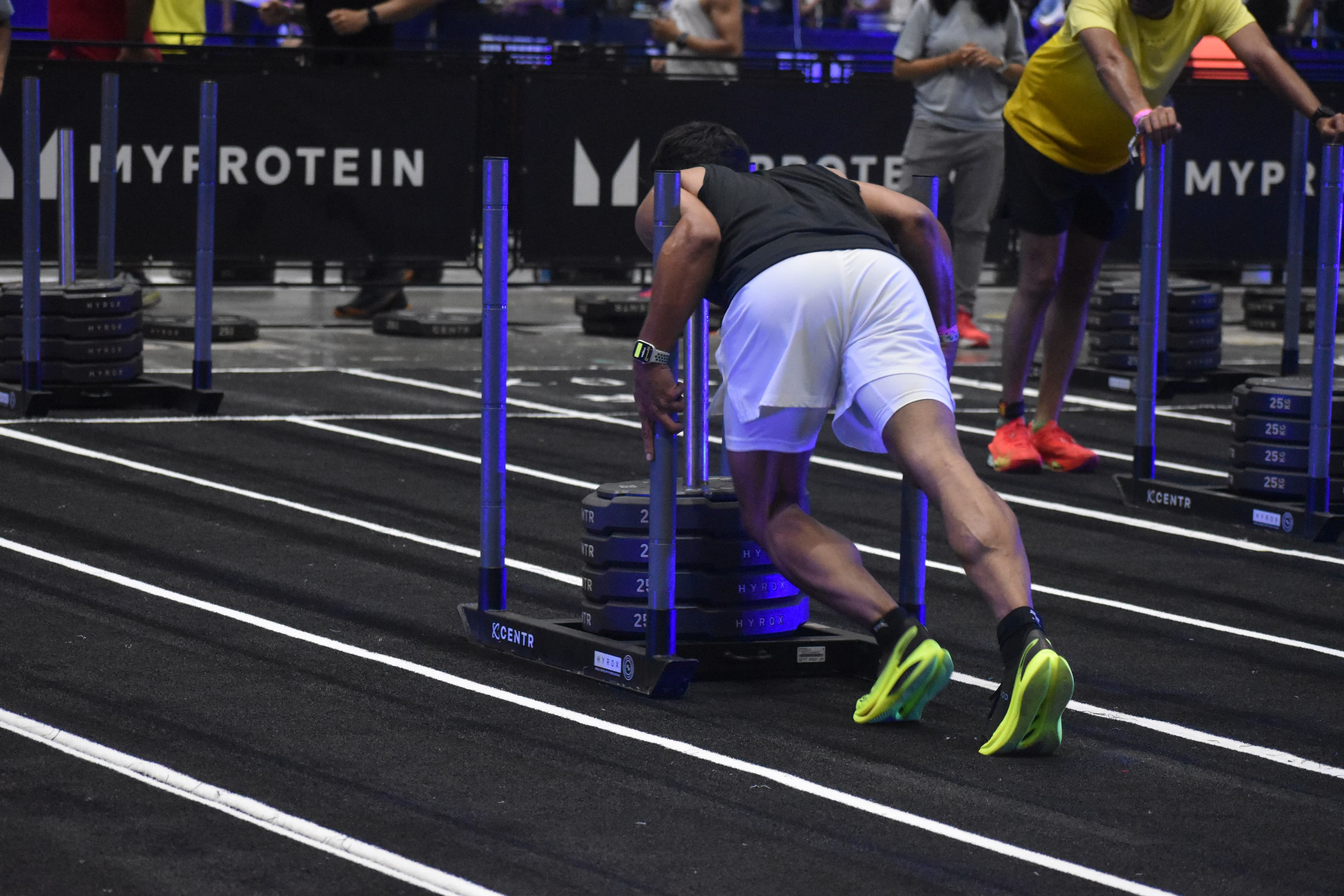 Sled push — the calves that look the part and still gave out three stations later